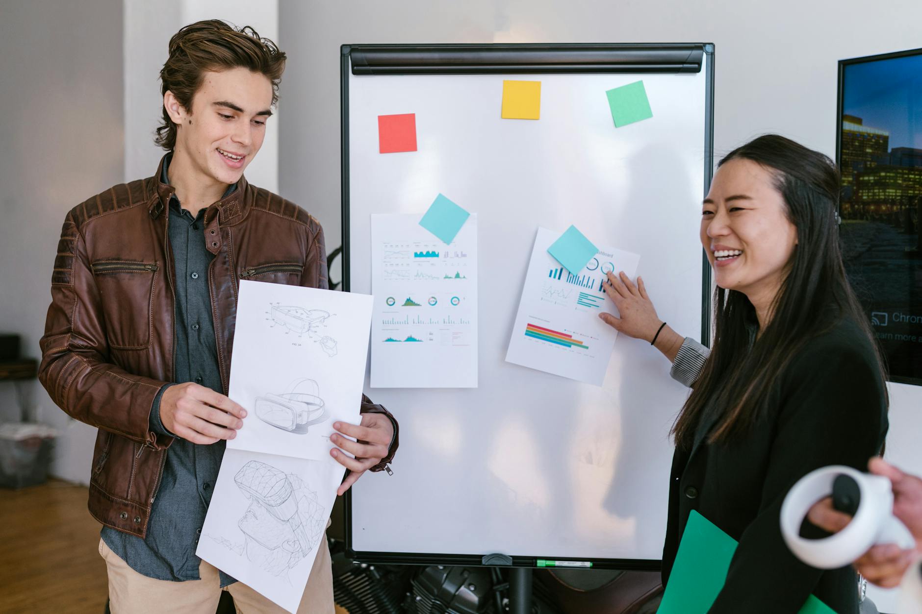 woman in black jacket holding white printer paper learning how to finance a saas business 